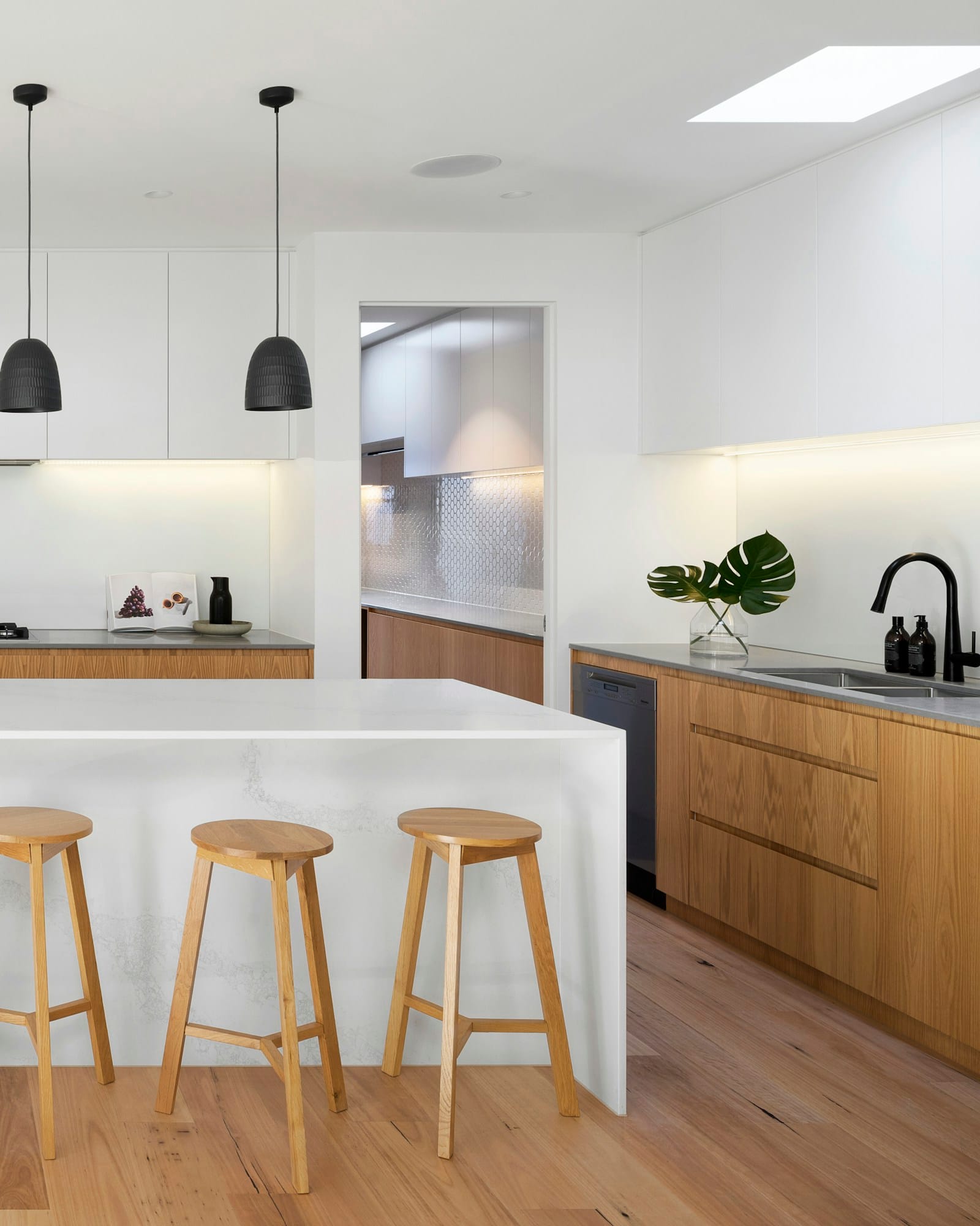 The kitchen worktop seen from the open-plan living space
